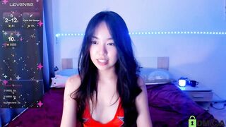 mitsuko_ - Cute Asian girl sings on camera.