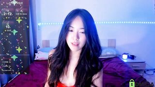 mitsuko_ - Cute Asian girl sings on camera.