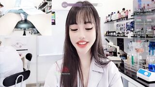 lab__ -Chinese nurse having fun at work