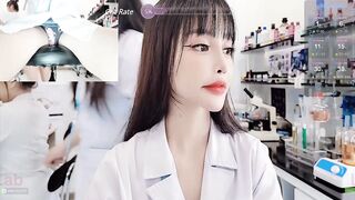 lab__ -Chinese nurse having fun at work