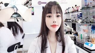 lab__ -Chinese nurse having fun at work