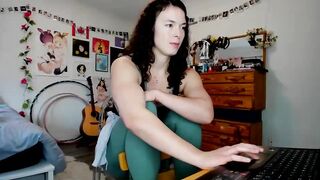 tiggerrosey - A young woman sits in her clothes and teases her