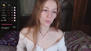 amont69 -Young college girl teasing in her clothes in front of the camera