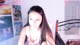 miwa_kasumi - A young Asian girl sits chatting and teasing in front of the camera.