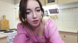 emilyquen -Charming housewife dancing in a dress in the kitchen