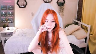 asuka_kawaii - The little red-haired girl sits and chats sweetly.